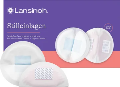 A box of Lansinoh nursing pads with several pads displayed.