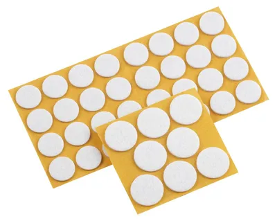 Immagine prodotto di Feltrini autoadesivi - 104 pezzi - Ø 22 mm e 28 mm - Bianco - Per parquet, laminato e piastrelle