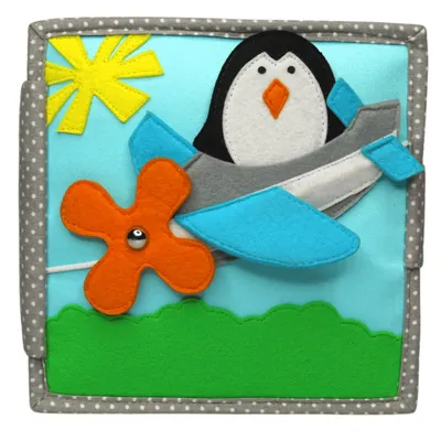 Produktbild von Jolly Designs Stoffbuch Kleiner Pilot zum Thema Origami Uhrzeit für Kinder ab 3