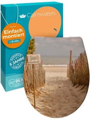 Produktbild von Calmwaters® WC Sitz Motiv Sandstrand einfache Montage, Toilettendeckel bis 250 kg, EU, antibakterieller Duroplast, Absenkautomatik, 2 Montage Optionen, abnehmbar, Klobrille, oval