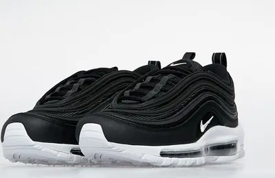 A pair of black and white Nike Air Max 97 sneakers.