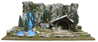 Productafbeelding van Kerststal landschap - Hut, vijver en bergwand - 36 x 56 x 25 cm - Verlicht LED-rivier