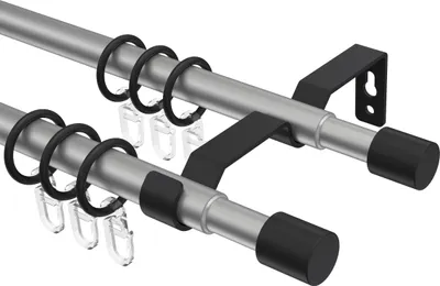 A close-up, studio shot of a double curtain rod system.