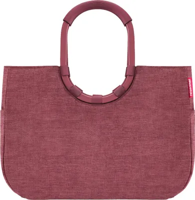 A maroon reisenthel loopshopper bag with maroon handles against a white background.