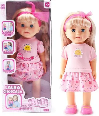 A doll in its packaging and standing next to it.