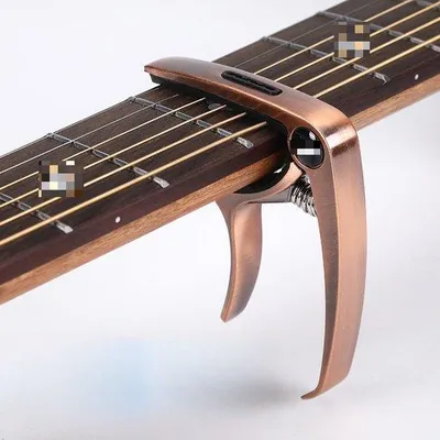 Image de Pince 3-en-1 pour guitare, pour guitare acoustique et électrique, lot de 2, ukulélé, accessoires pour instruments à cordes, capodastre/pince tonique/pince accordeur, bronze