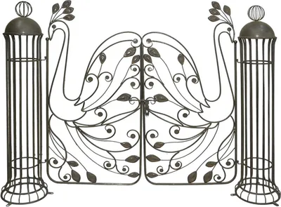 A wrought iron gate with two peacock designs and two cylindrical pillars.