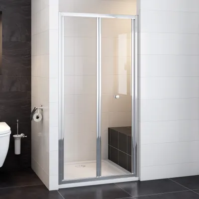 A modern bathroom with a shower enclosure, toilet, and sink.