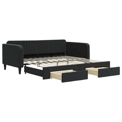 A black upholstered daybed with its drawers pulled out, revealing the wooden slatted base.