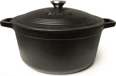 A black cast iron pot with a lid is shown against a white background.