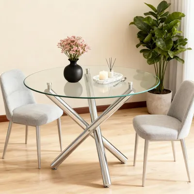 Image de Table ronde, plateau en verre, pieds en métal, style moderne et minimaliste