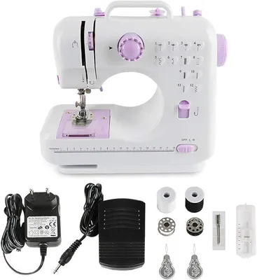 A white and purple sewing machine with accessories laid out below it.