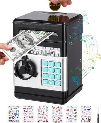 A person is inserting a US dollar bill into a black and silver electronic piggy bank with a keypad and a dial.