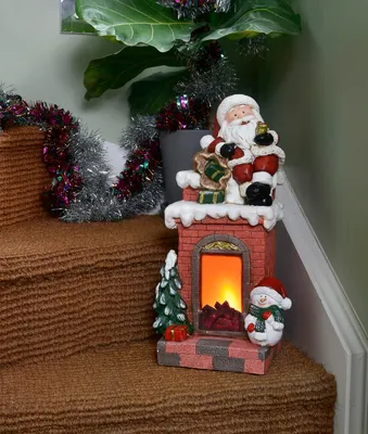 Produktbild von Dekofigur Weihnachtsmann mit Kamin und LED Beleuchtung mit Timer 50 cm