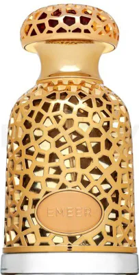 A close-up studio shot of a gold perfume bottle.