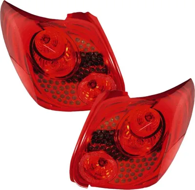 Image de Jeu de feux arrière gauche et droit 12 V P21W PY21W W5W HELLA pour entre autres PEUGEOT 207