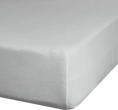 A close-up, angled view of a white or light gray fitted sheet.