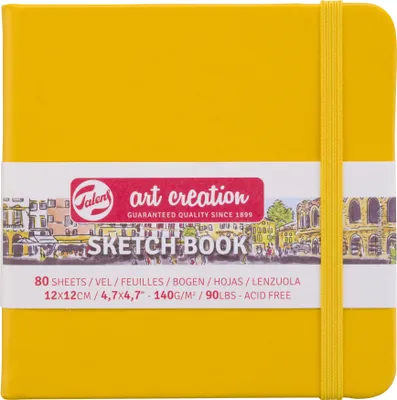 A yellow sketchbook with a white band of text and graphics around it.