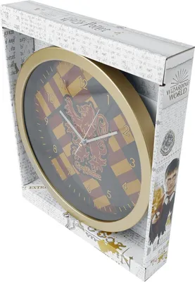 A Harry Potter Gryffindor clock in its packaging.