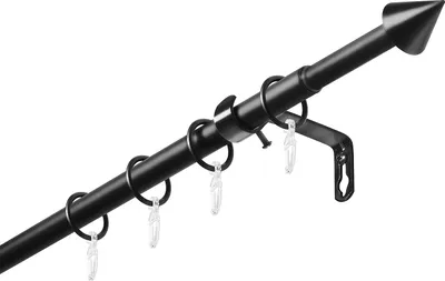 A black curtain rod with rings and clips, shown diagonally against a white background.
