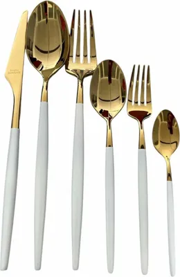 A set of cutlery with gold-colored heads and white handles, arranged against a white background.