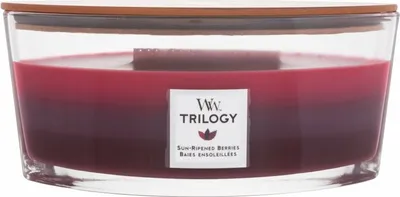 A multi-layered candle in a glass jar with a wooden lid.