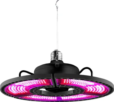 A black LED grow light with pink and purple lights, suspended by a wire.