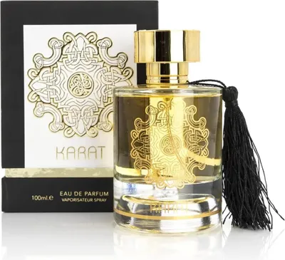 A perfume bottle and its packaging are displayed against a white background.
