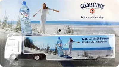 Produktbild von Gerolsteiner Naturell Spielzeug 3 x LKW Wagen