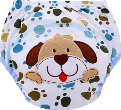 A close-up view of a baby training pant with a dog design.