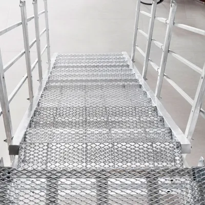 A metal outdoor staircase with handrails.