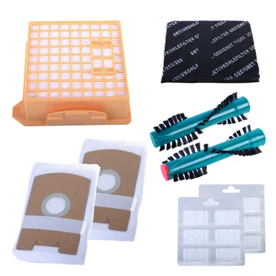 A collection of vacuum cleaner replacement parts arranged on a white background.
