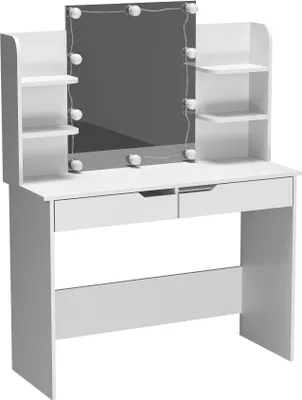A white vanity table with a mirror and lights.