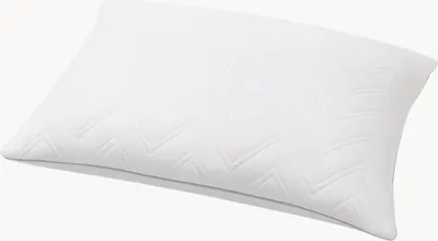 A white pillow with a subtle chevron pattern is shown against a white background.