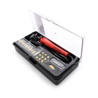A product shot of a wood burning/soldering iron kit in its case.