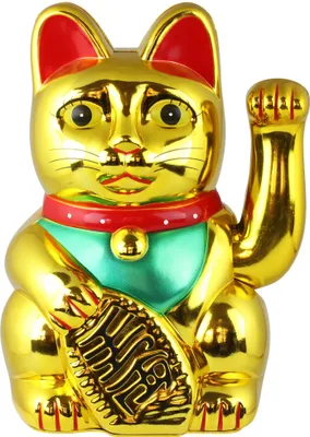 A golden Maneki-neko (lucky cat) figurine.