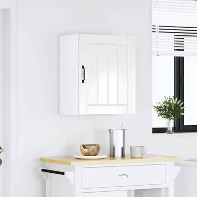 A white corner cabinet is mounted on a white wall above a white kitchen cart with a wooden countertop. A window with blinds is visible on the right side of the image.