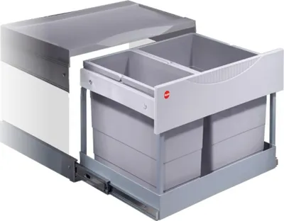 A pull-out kitchen waste bin system with two compartments, shown extended from a cabinet.
