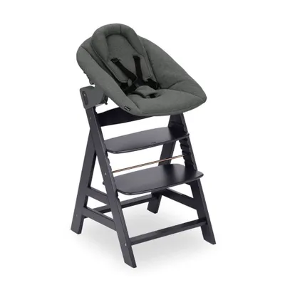 A dark gray wooden high chair with a gray newborn set attached.