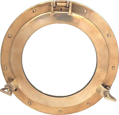 A brass porthole window against a white background.