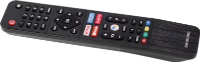 A black remote control with various buttons is shown against a white background.