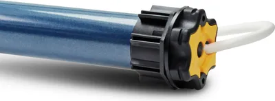 Close-up of a roller blind motor on a white background.