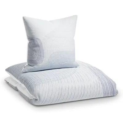 A neatly folded duvet and pillow set with a subtle wave-like pattern.