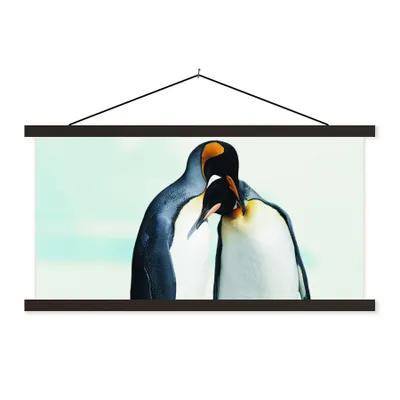 Produktbild von MuchoWow® Textilposter Pinguine - Schnee - Familie 90x45 cm mit schwarzem Rahmen - Klemmleisten
