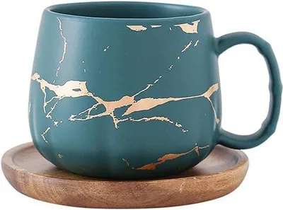 Produktbild von Keramische Kaffeebecher grün Holzuntersatz