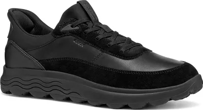 A black Geox men's clog is shown from the side against a white background.