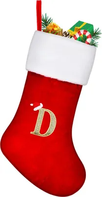A red Christmas stocking with a white trim, decorated with a gold letter 'D' and a small Santa hat. The stocking is filled with Christmas-themed items like small gift boxes, pinecones, and a candy cane.
