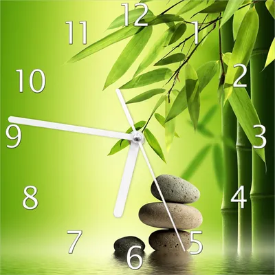 Produktbild von Wallario Design Wanduhr Steinstapel im Grünen aus Echtglas, Größe 20 x 20 cm