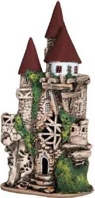 Ein großes Keramikhaus, die eine zerfallene Elfenburg darstellt. Die Struktur ist detailliert.