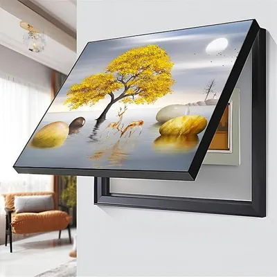 A decorative cover for an electrical box, featuring a landscape painting, is shown mounted on a wall.